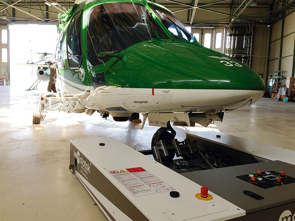 Mototok M 528 tows an AgustaWestland A109